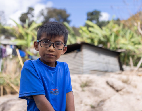 Vision for the Poor Photo of young boy with new glasses