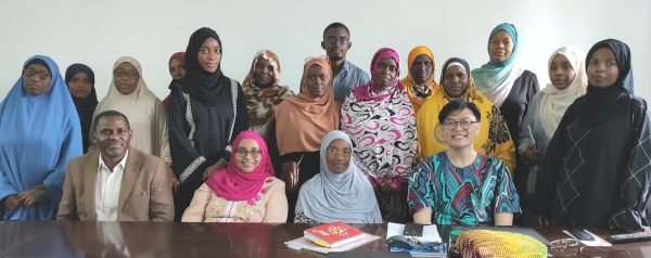 A photo of a group of people involved in the project around Zanzibar's first National Eye Health Strategic Plan.