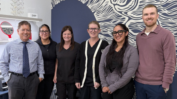 A photo of Dr. Eric White and Team